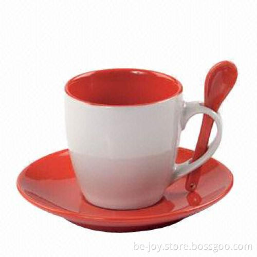Stoneware cup and saucer with spoon